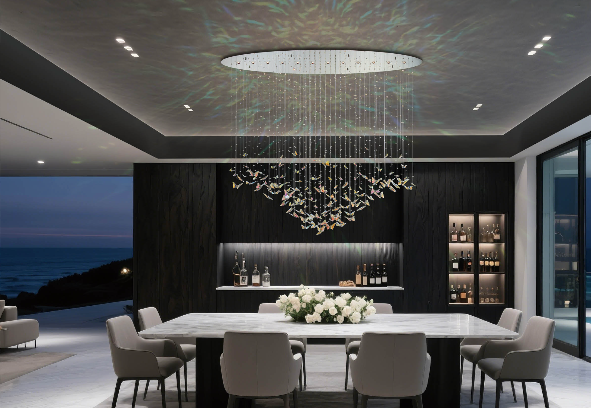 Butterfly crystal chandelier installation in coastal Marbella villa dining room overlooking the Mediterranean