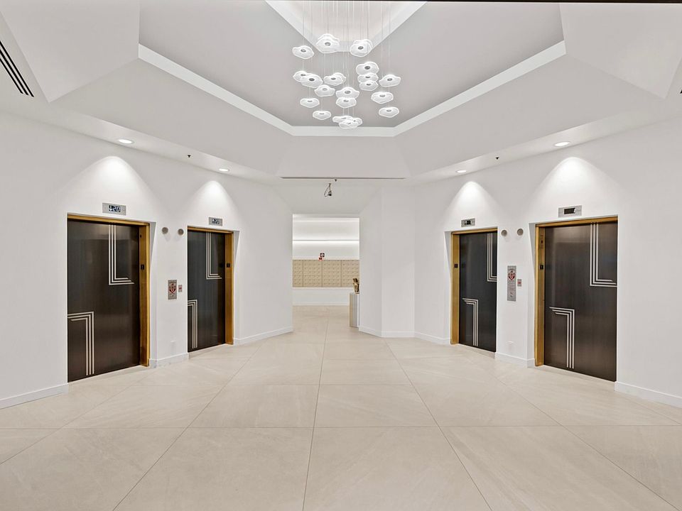 Lotus Leaf modern chandelier supplied by HDLS Lighting Ltd for the reception at Pacific Park Plaza, Emeryville, California.