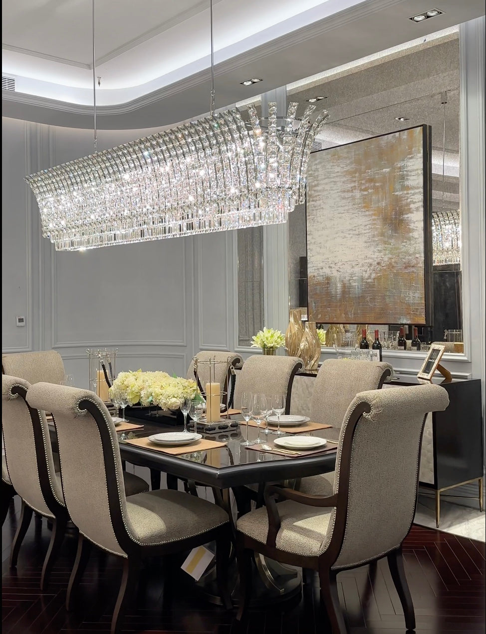 Video of the Plaza Crystal Linear Grande Chandelier installed above a luxury dining table, highlighting scale and crystal detail.