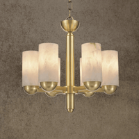 Close-up of hand-carved Spanish alabaster cylinder shades on the Alabaster Anima chandelier
