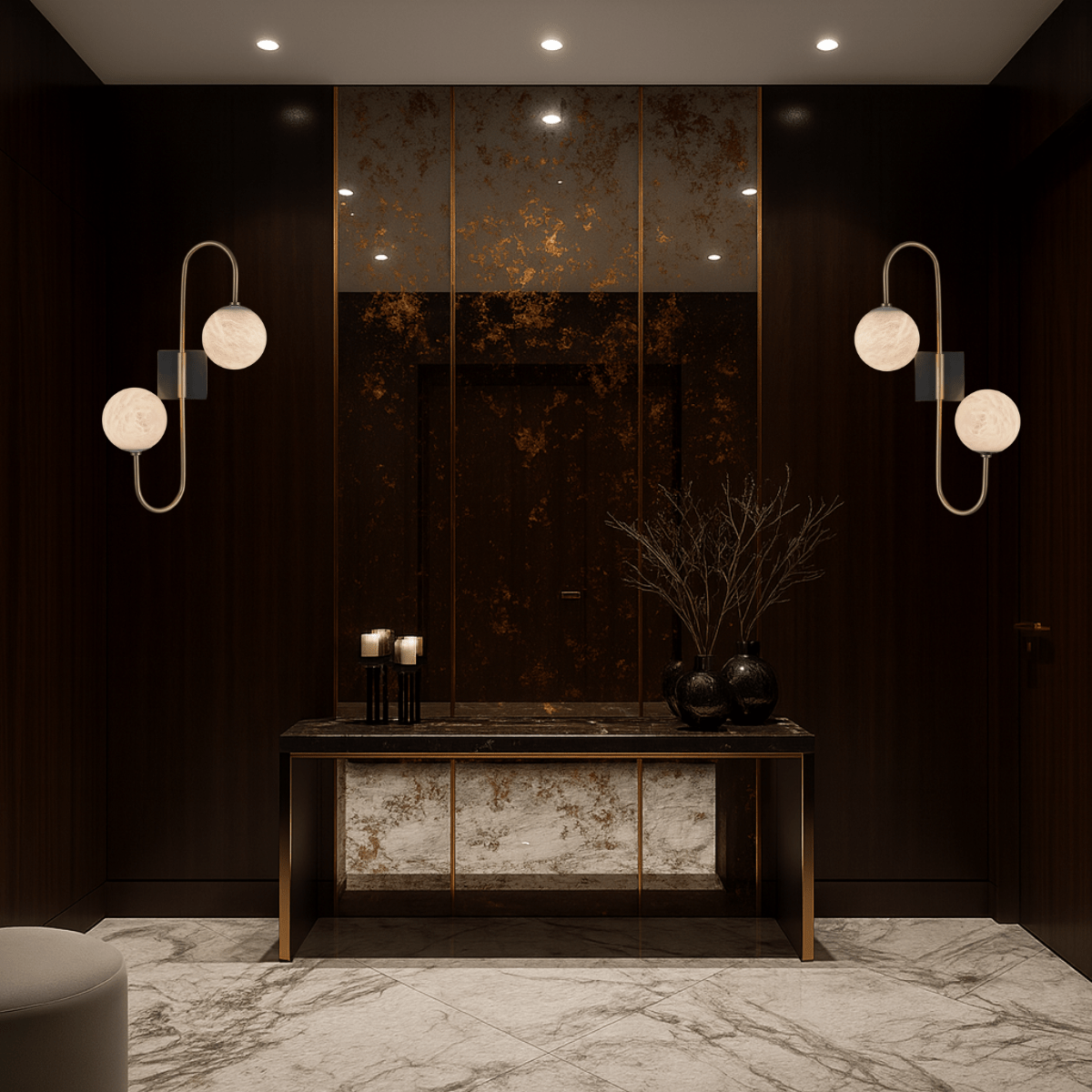 Two alabaster wall lamps lighting a luxury entryway with marble and dark wood