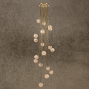 Tall cascading alabaster globe chandelier with brass frame for luxury staircases