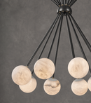 Close-up of Alabaster Valeria chandelier with Spanish alabaster spheres and black metal framework