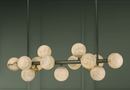 Close-up of the Alabaster Volta chandelier showing hand-carved alabaster globes.