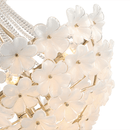 Detailed shot of hand-blown white glass flowers on the Camellia Bloom chandelier.