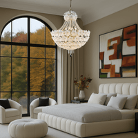Camellia Bloom chandelier illuminating a modern beige bedroom with large windows.