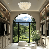 White floral Murano-style flush mount chandelier illuminating luxury dressing room with tall windows.