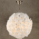 Camellia Fiorita Globe chandelier with white Murano-style glass flowers on a gold sphere.
