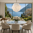 Large Camellia Fiorita Globe chandelier above a dining table with lake and mountain views.