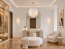 Camellia Fiorita Globe chandelier in a luxury white dressing room with matching floral wall lights.