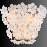 Murano-style floral wall sconce in white glass, luxury designer wall lighting by HDLS Lighting.
