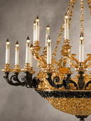 Close-up of Opéra Noir Majesté chandelier showing matte-black copper and 24K gold-plated detailing.