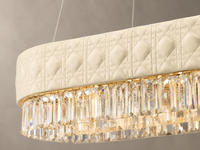 Close-up of ivory quilted leather and crystal detailing on Florence Trapunto Neve chandelier