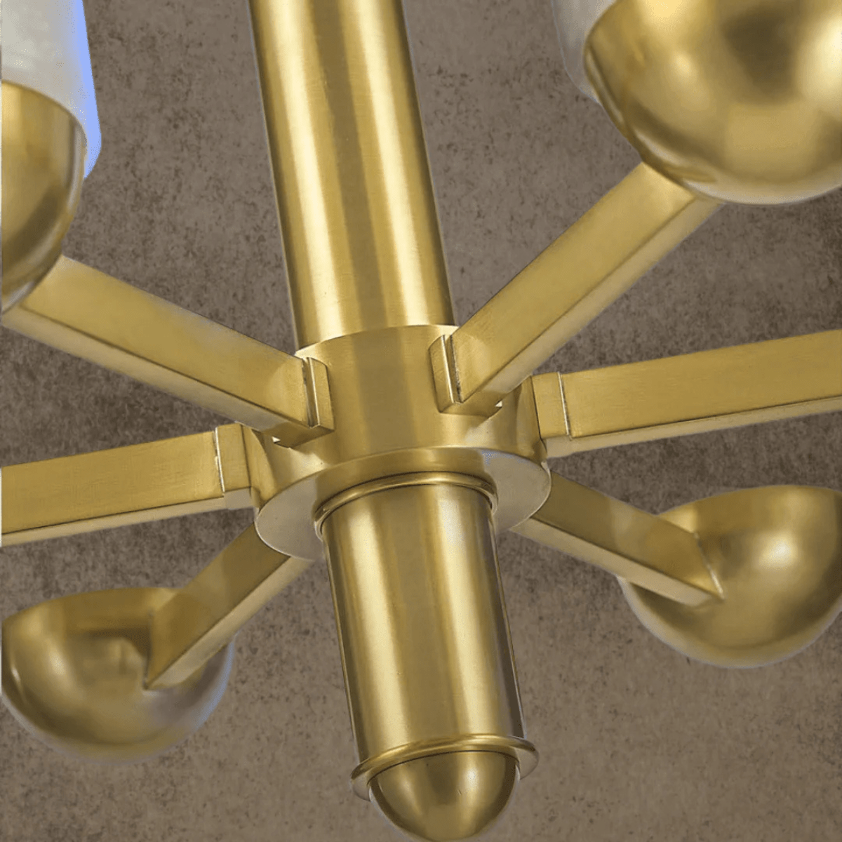 Close-up of brushed copper chandelier arm and structure for Alabaster Anima