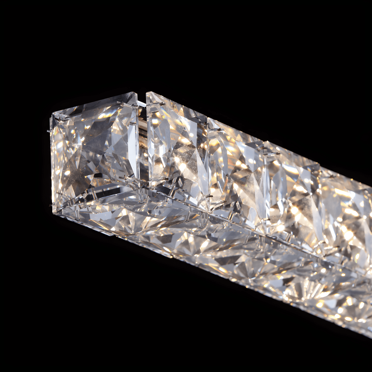 Close-up of the Halo Luxe Elara precision-cut lead-free crystal bar showing texture and reflective detail.
