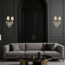 Elegant designer wall lights mounted beside arched doors in a sophisticated living room setting