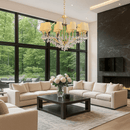 Gold and ivory chandelier featured in contemporary living room with marble and large windows.