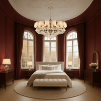 Elegant gold chandelier with ivory shades featured in a luxury French-style bedroom interior by HDLS.