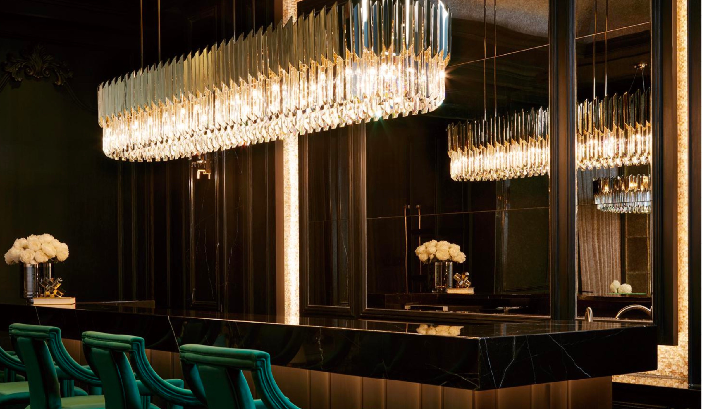 Luxurious bar interior with gold crystal chandelier and mirrored black walls – HDLS Lighting Ltd