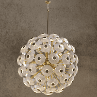 Large Modernus Moon chandelier with hand-textured Murano-style glass discs on a gold frame against a warm stone backdrop.