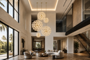 Modernus Moon globe chandeliers in a spiral installation inside a double-height Beverly Hills villa.
