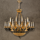 Opéra Noir Majesté black and gold French chandelier in 24K gold-plated copper on a neutral background.