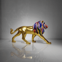 Reverse side view of AHURA Swarovski crystal lion sculpture with gold mosaic body