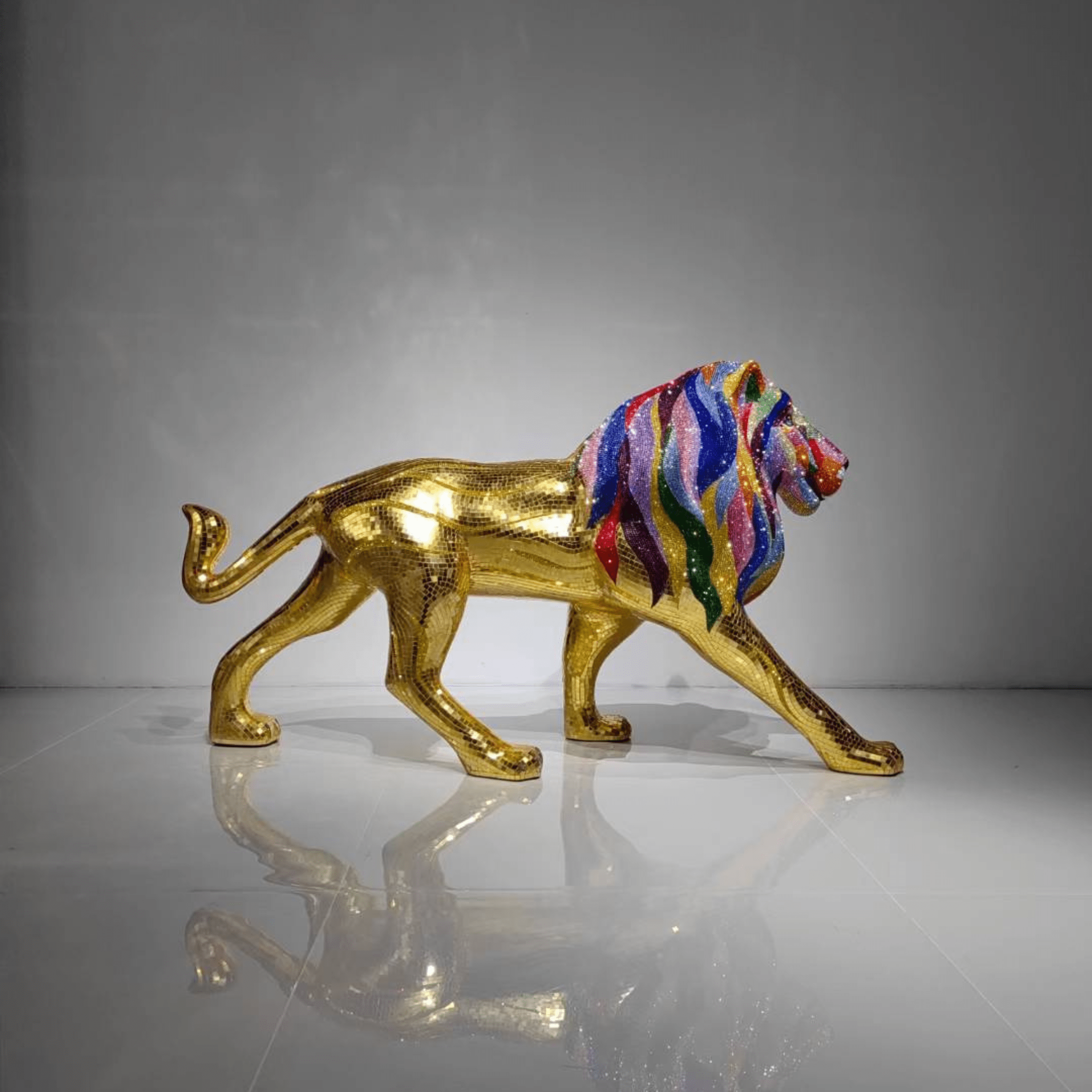 Reverse side view of AHURA Swarovski crystal lion sculpture with gold mosaic body