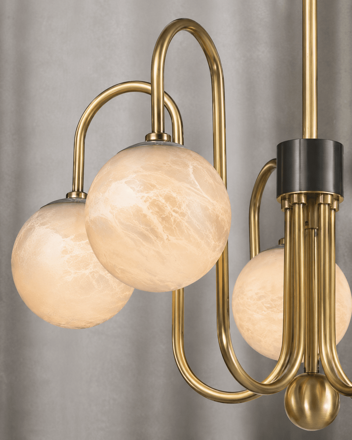 Close-up of Alabaster Aria chandelier with Spanish alabaster globes and brushed brass detailing by HDLS Lighting
