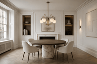 Alabaster Aria chandelier above marble dining table in a luxury Chelsea London residence with brass finish