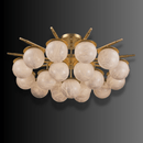 Luxury alabaster semi-flush ceiling light in brass gold with natural Spanish stone globes.