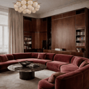 Alabaster Avelina chandelier installed in luxury living room with burgundy velvet seating.