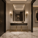 Alabaster Axis brass wall lights illuminating a luxury apartment entrance with marble flooring and mirror