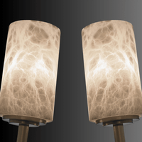 Close-up of illuminated natural alabaster stone showing unique veining and warm diffused glow.