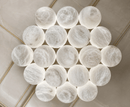 Spanish alabaster spheres close-up showcasing natural veining and architectural luxury lighting craftsmanship