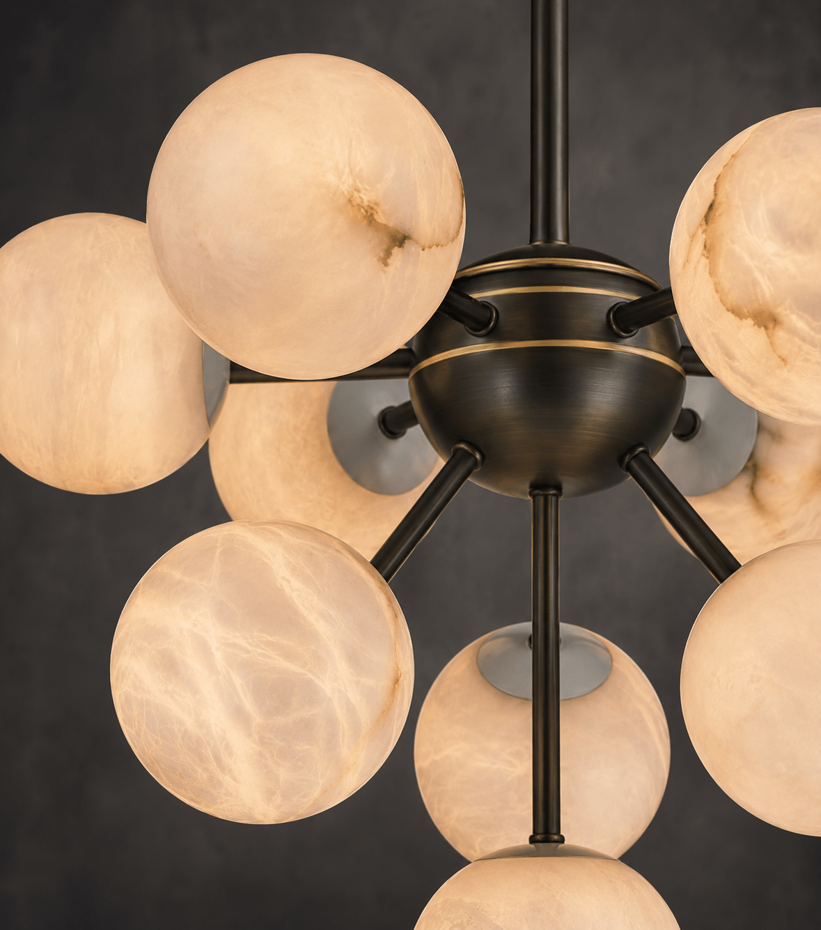 Close- up shot of the alabaster and metal parts of the Alabaster Novand chandelier.