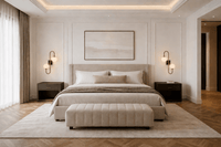 Luxury bedroom with Alabaster Sfera wall lights in natural Spanish alabaster and bronze architectural design