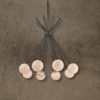 Sculptural alabaster pendant with eight hand-shaped Spanish alabaster globes suspended from a refined brass structure.