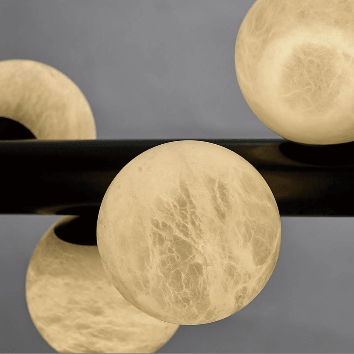 Close-up of Spanish natural alabaster globe showing unique veining and soft light diffusion