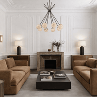 Alabaster pendant light installed in an elegant living room, creating warm ambient lighting with natural stone globes.