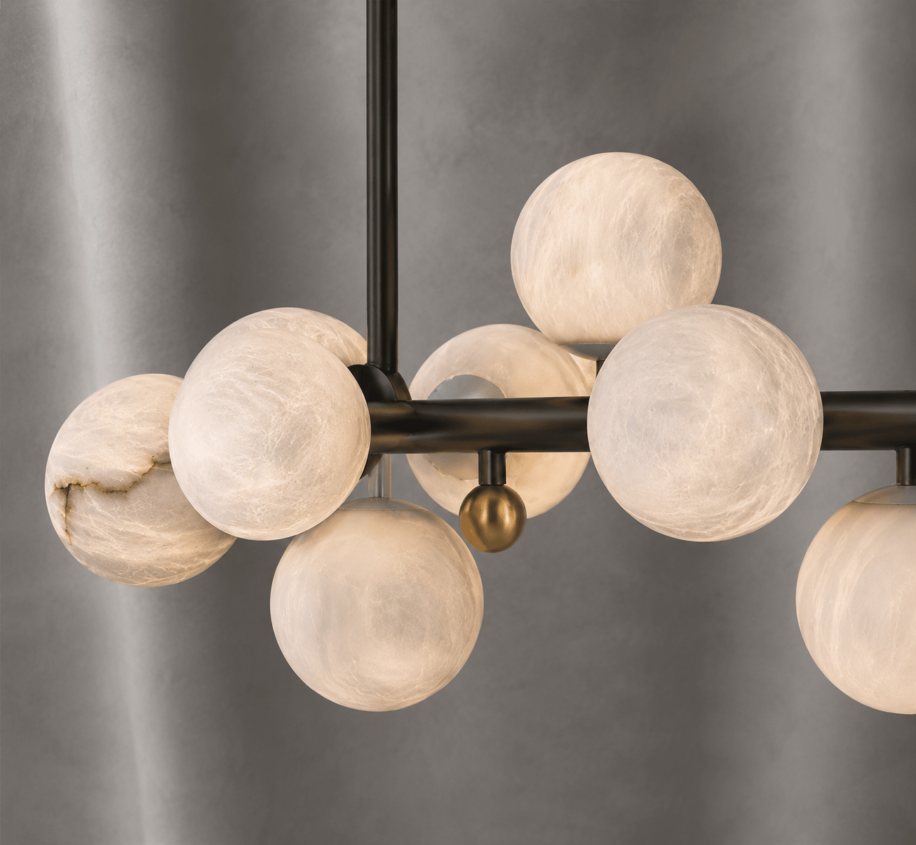 Alabaster Volta chandelier close-up with handcrafted Spanish alabaster spheres and premium metal frame