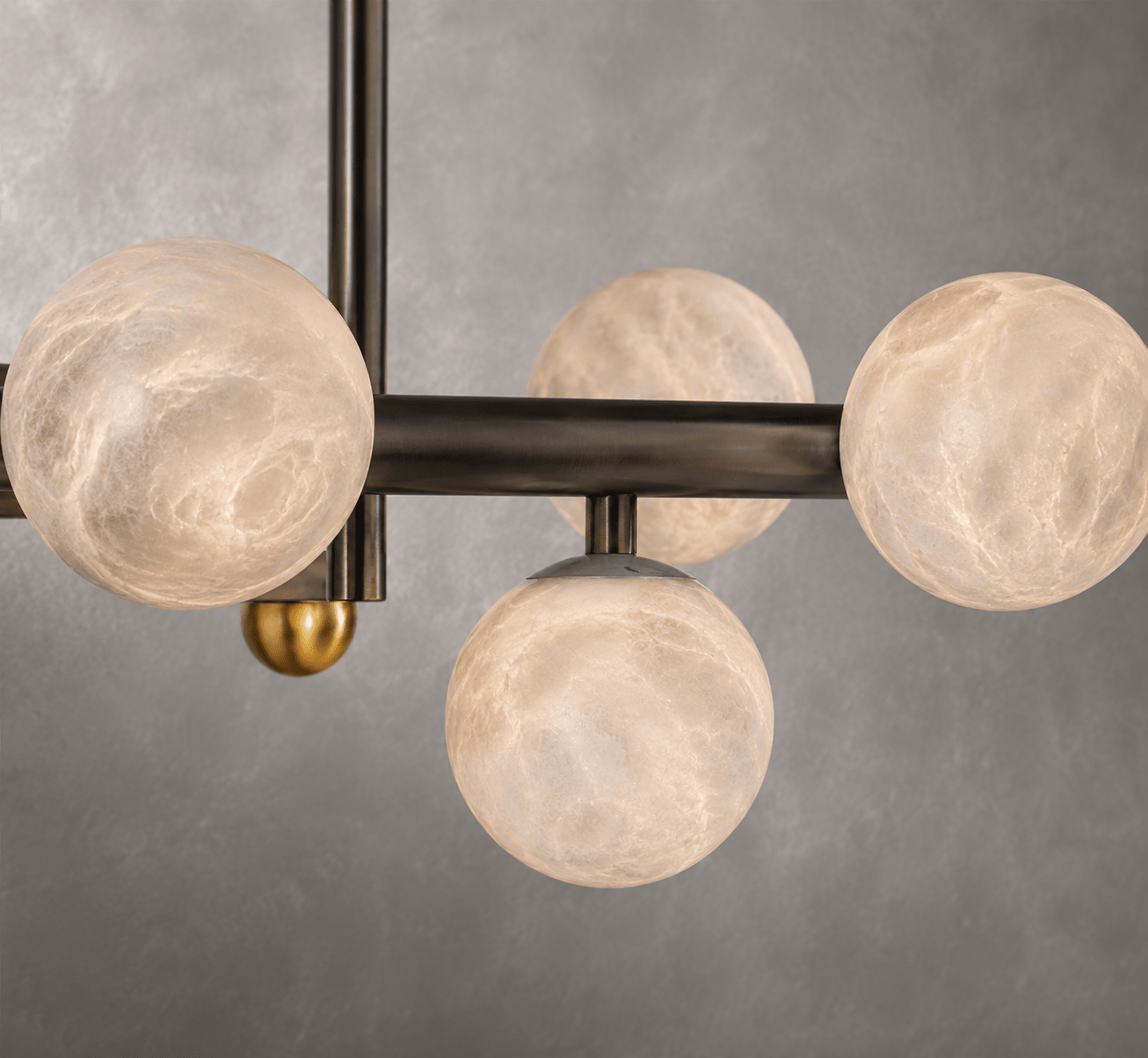 Luxury Alabaster Volta chandelier featuring natural Spanish alabaster globes and architectural metalwork
