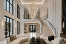 Athena Grand Tiered Crystal Chandelier installed in a luxury double-height foyer with grand staircase