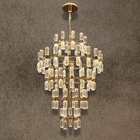 Athena Royale tiered crystal chandelier in polished gold with luxury crystal for grand foyer and double-height interiors