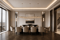 Aurelio Wave luxury crystal chandelier above grand dining table in Chelsea Harbour residence