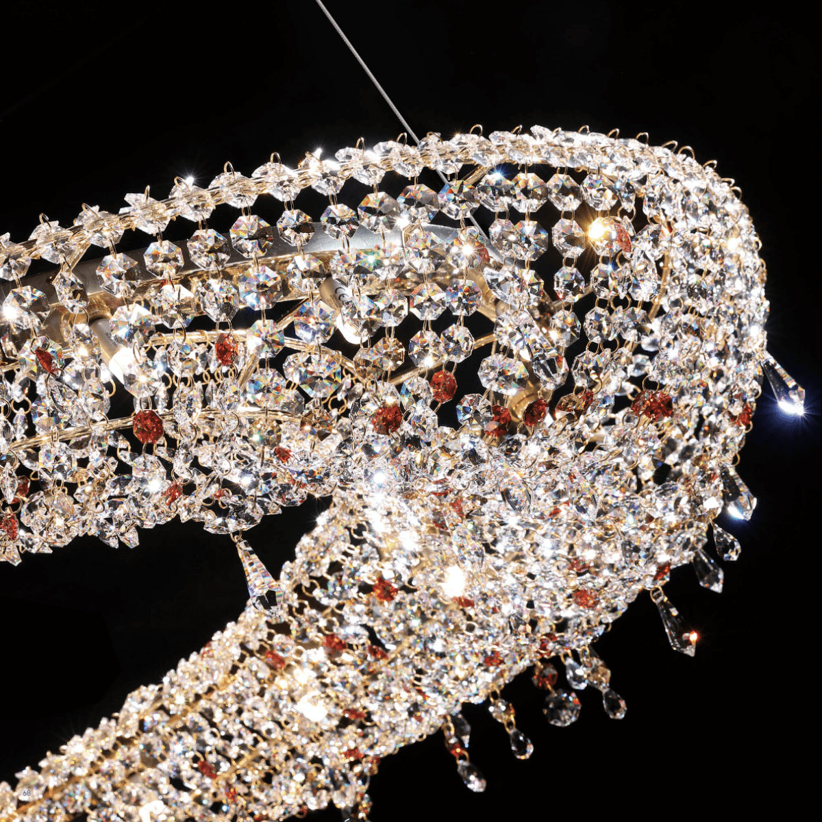 Close-up of Asfour crystal detailing on 18K gold-plated Aurelio Wave luxury chandelier