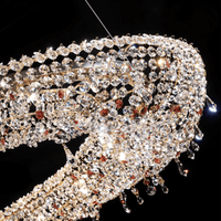 Close-up of Asfour crystal detailing on 18K gold-plated Aurelio Wave luxury chandelier