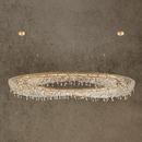 Aurelio Wave Oval large crystal chandelier in 18K gold-plated copper with precision-cut Asfour crystal.