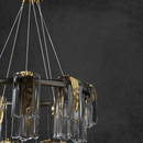 Close-up of Aurora Maestra chandelier showing textured Murano-style glass, polished brass hardware, in brown.