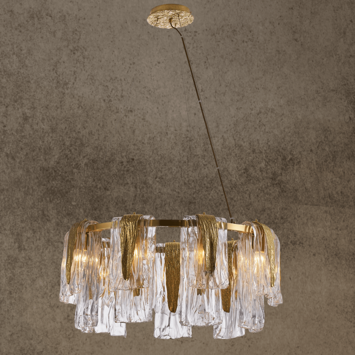 Aurora Sublime chandelier featuring Murano-style glass and brass in a sculptural circular composition